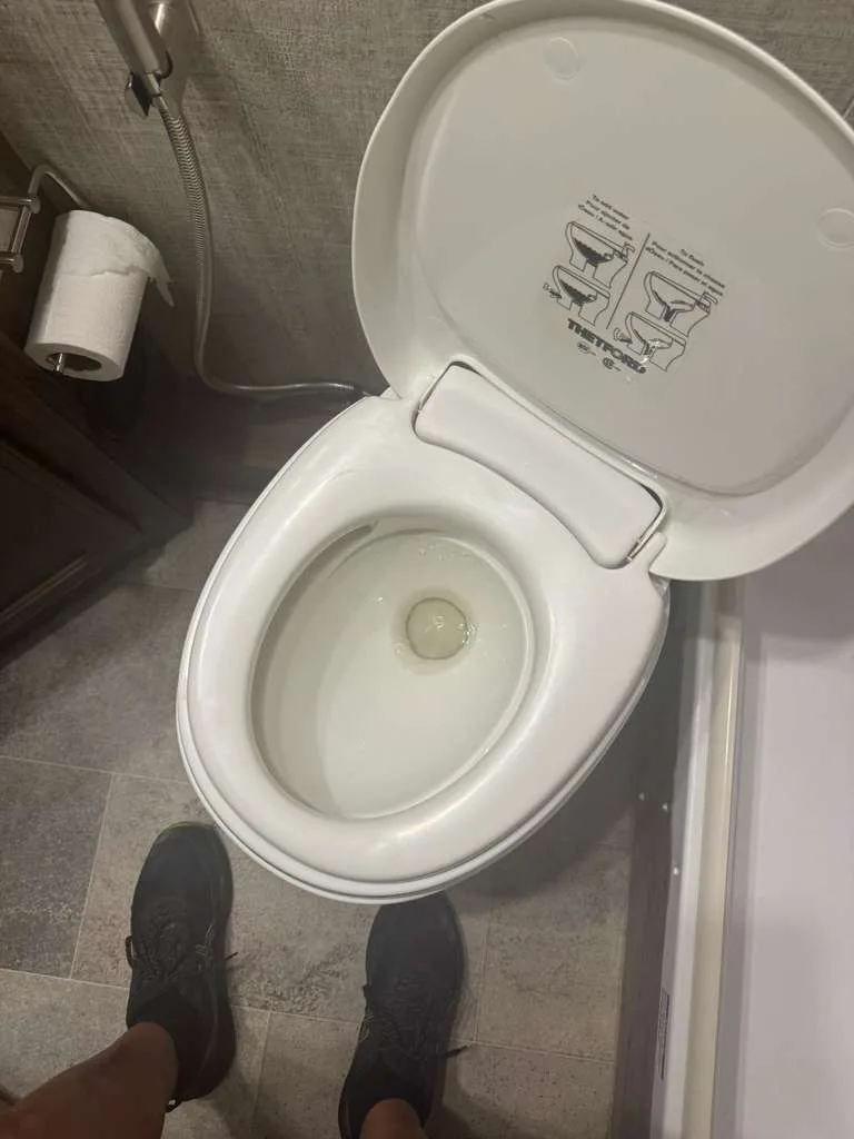 RV toilet replacement on-site by a Heritage RV technician