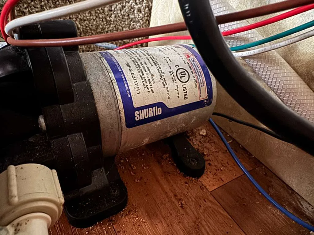 RV water pump diagnosis and replacement during a mobile service call